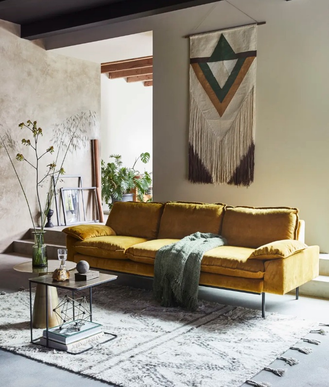 Large sectional seating sofa arranged in an open concept family living space
